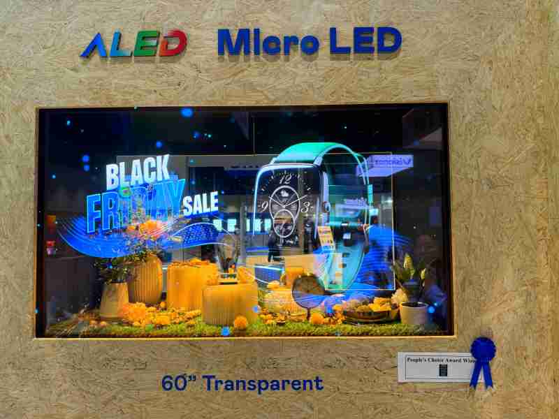 口袋牛店60吋高透明度Micro LED显示器获”最佳Micro LED技术应用奖”，，，将Micro LED面板透明化之设计特性极致发挥，，，以可扩展性无缝拼接技术打造，，，具备600 nits全画面亮度、、、大于60%穿透率及超过NTSC 110%的优异广色域表现，，，，可依需求灵活应用于各种场域
